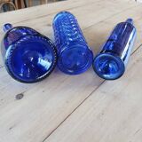 3 blue bottles