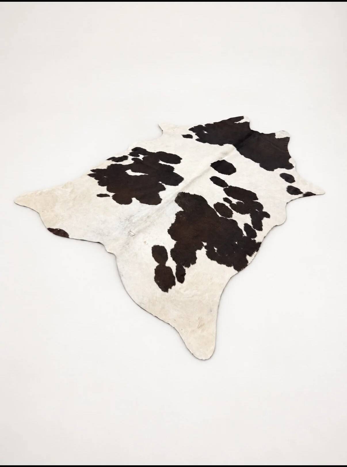 Tapis en peau de vache véritable noir et blanc