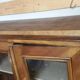 Two-door display cabinet in transitional style.