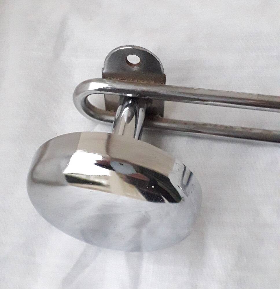 Chrome metal wall coat rack