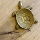 Vintage brass turtle pocket emptier