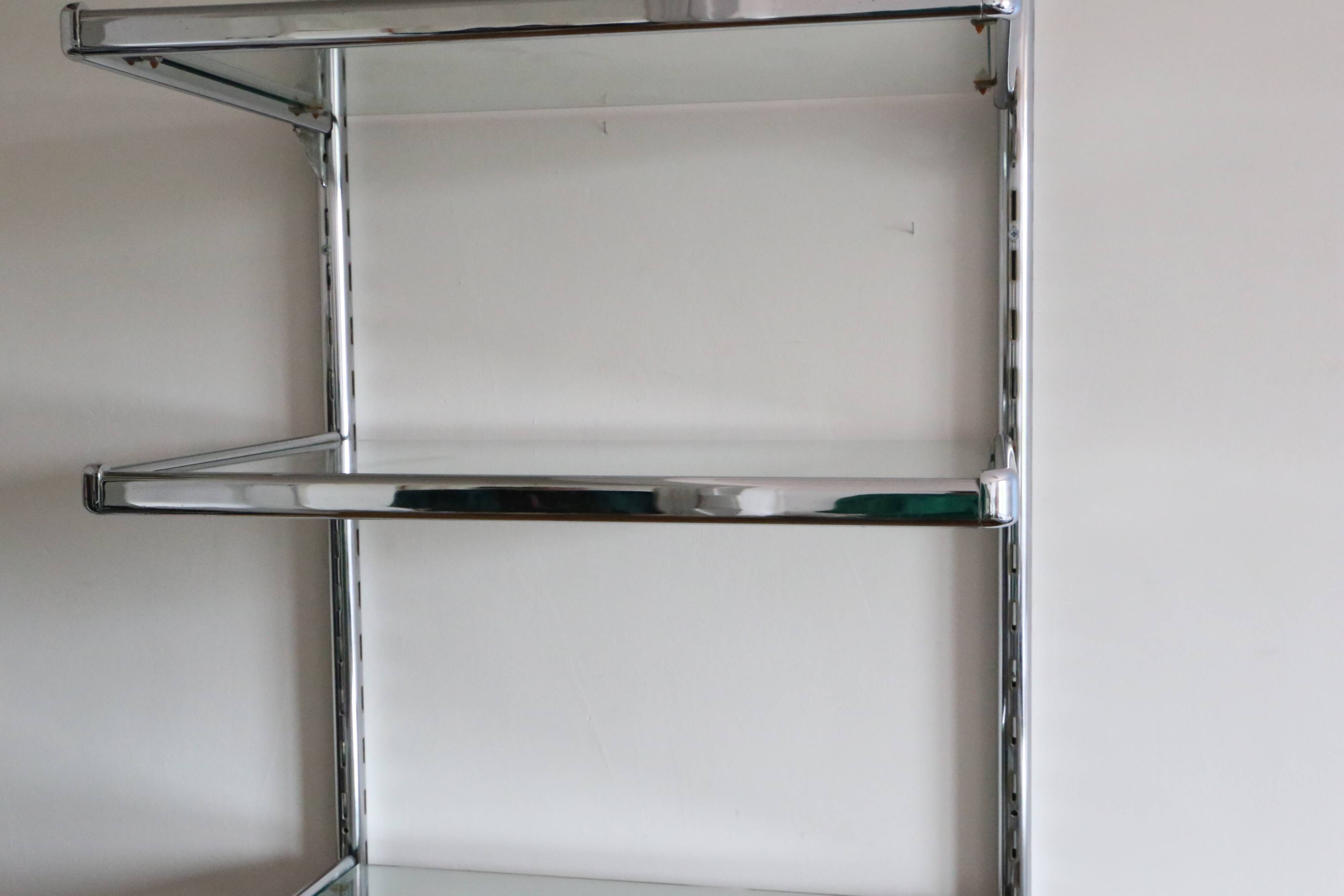 Chrome and glass wall shelf, circa 1960