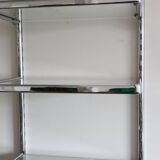 Chrome and glass wall shelf, circa 1960