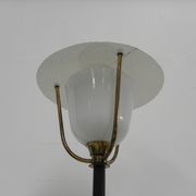 Standing vintage lamp with glass shade and perforated steel shade