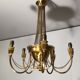 Neoclassical style brass chandelier decorated with pearl garlands