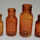 Suite de quatre vases soliflore flacons bouteilles d'apothicaire