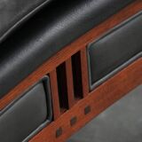 Black cowhide leather and wooden Art Deco design armchair