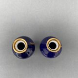 Pair of 1900 Limoges vases with blue background and gold highlights, R. Rosier decorations
