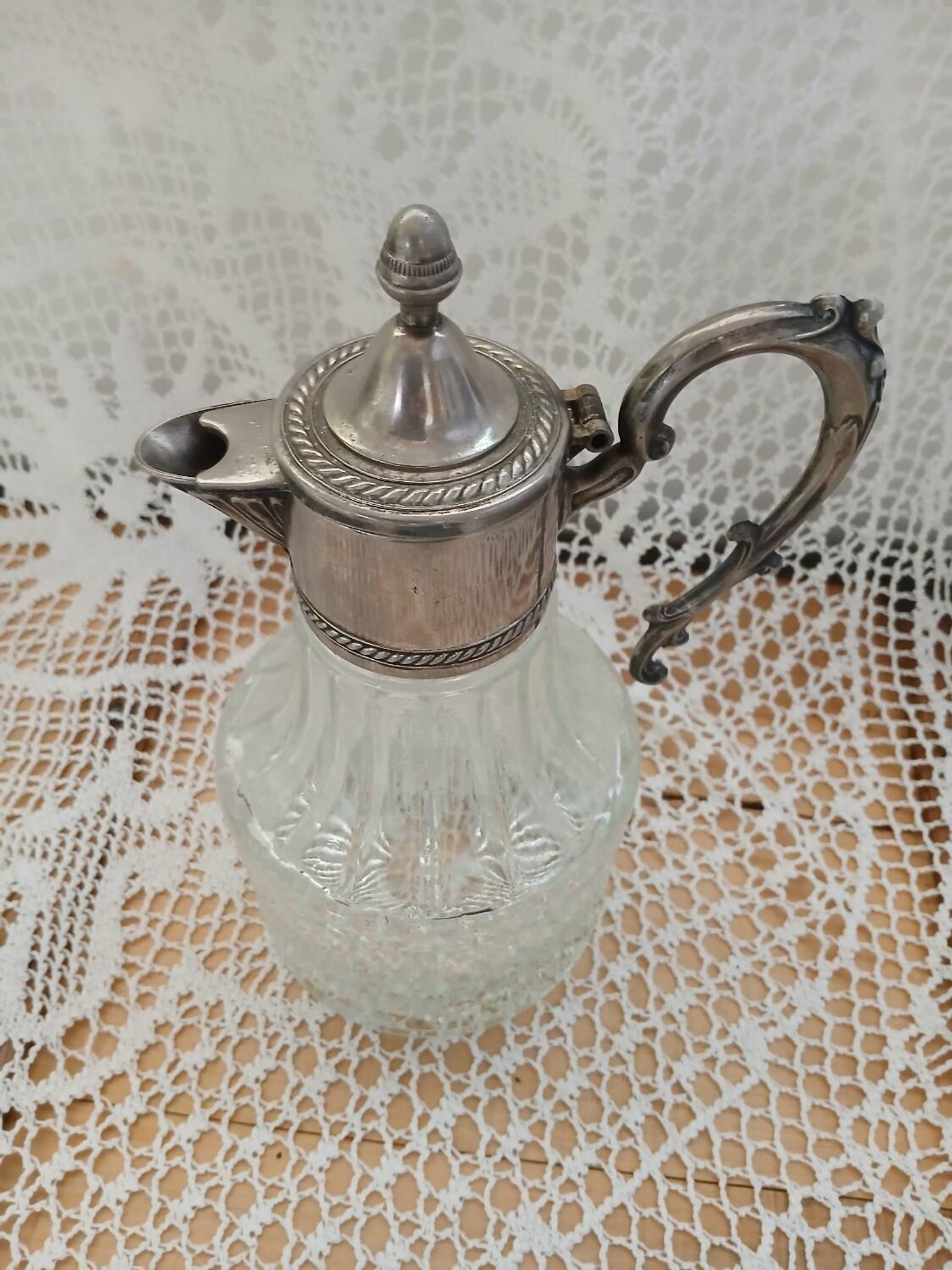 Antique pewter and glass carafe