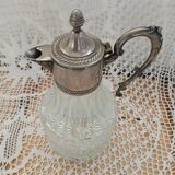 Antique pewter and glass carafe