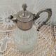 Antique pewter and glass carafe
