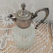 Antique pewter and glass carafe