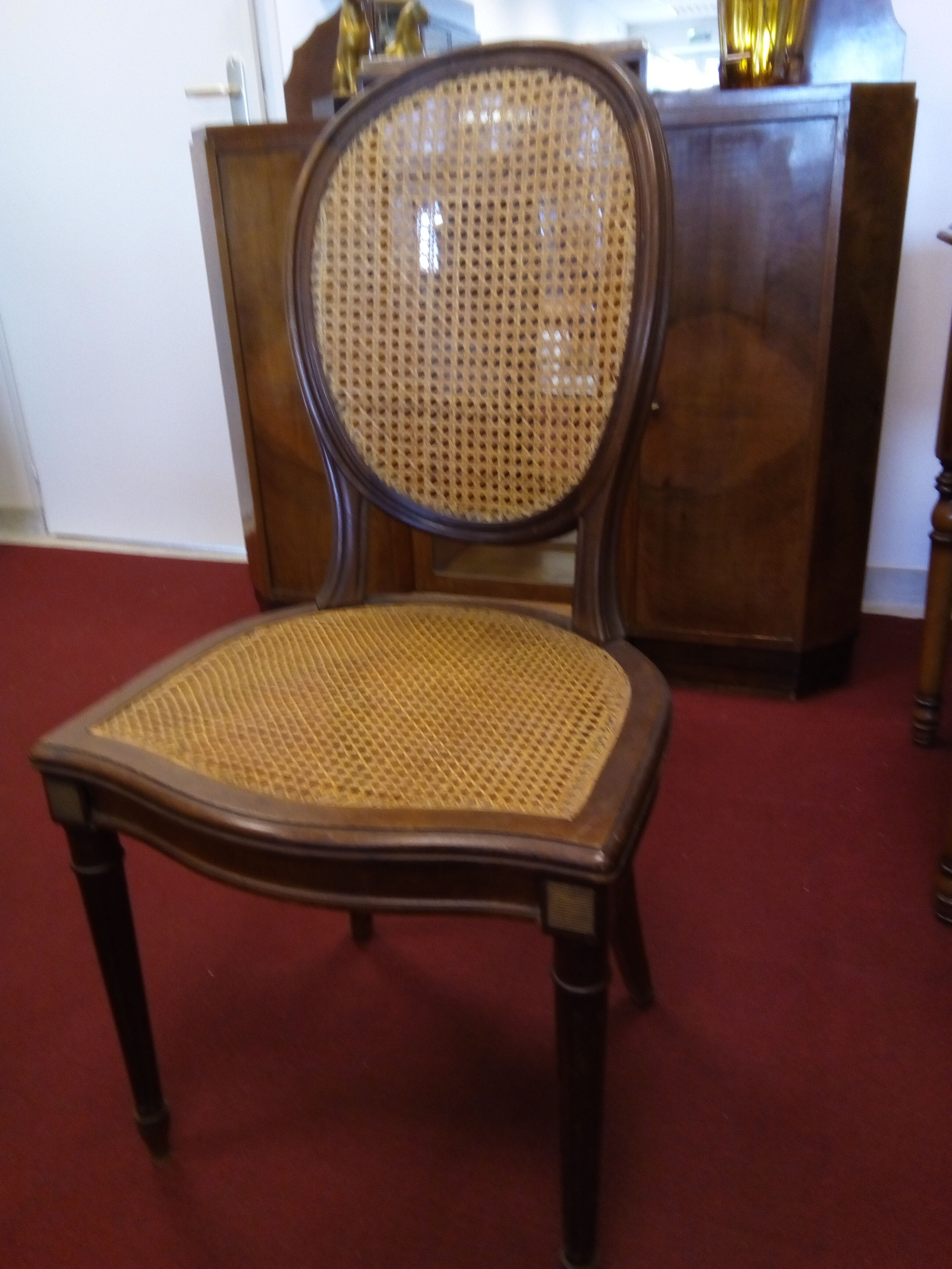 Set de 4 chaises cannées de style Louis XVI