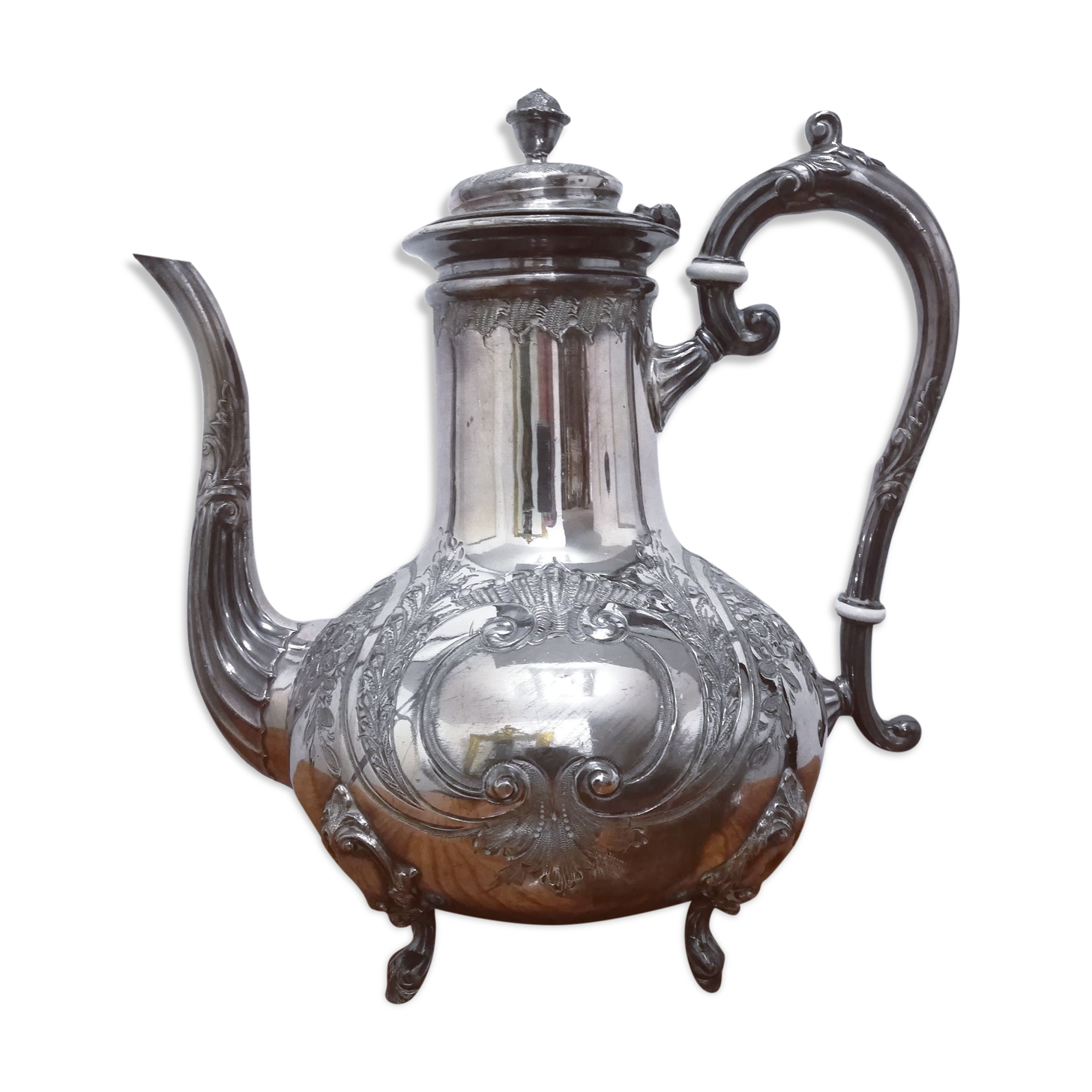 Silver metal teapot in Louis XV style