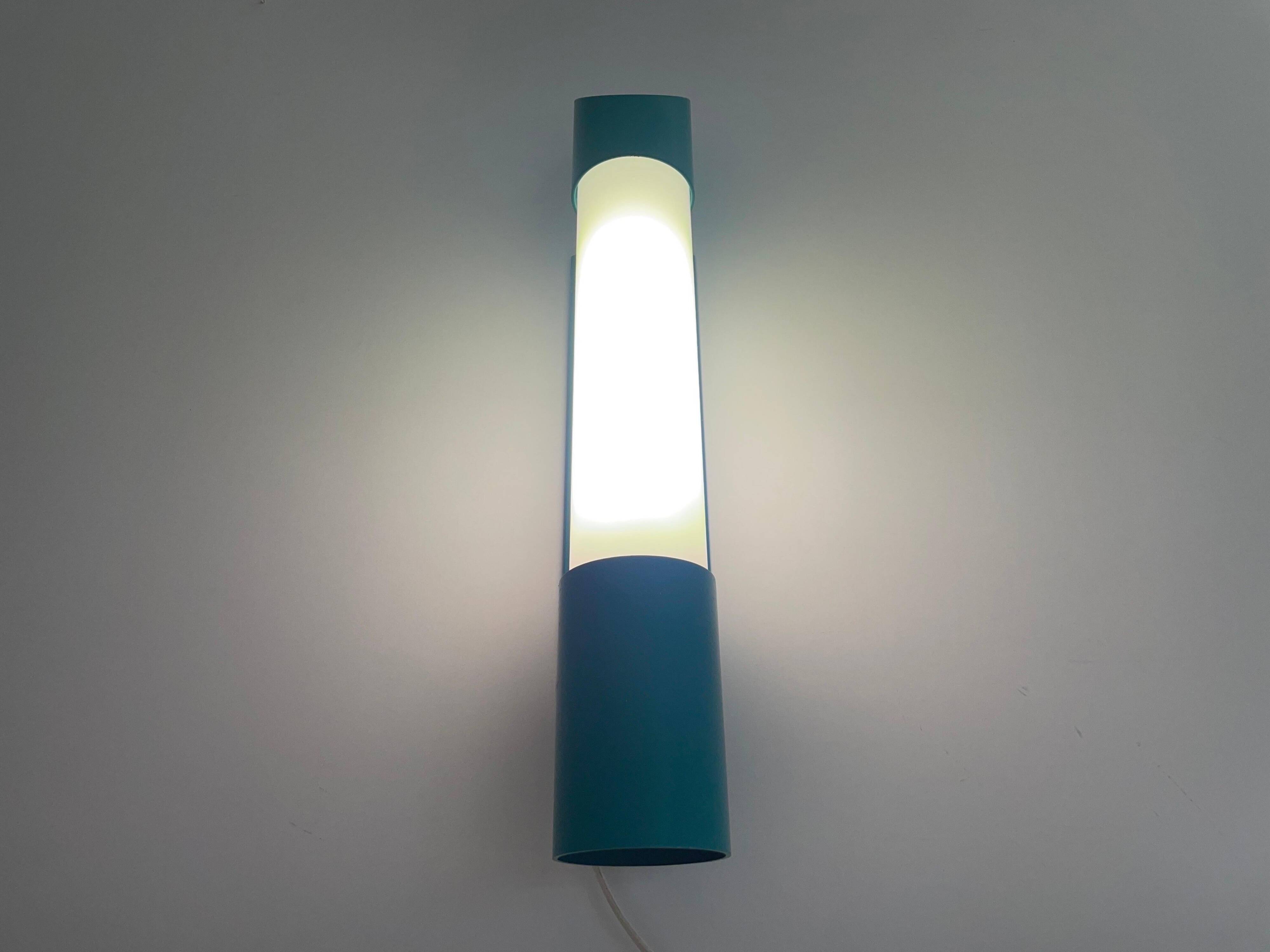 Simple cylindrical wall light in opal glass and turquoise metal, 1970s, Germany