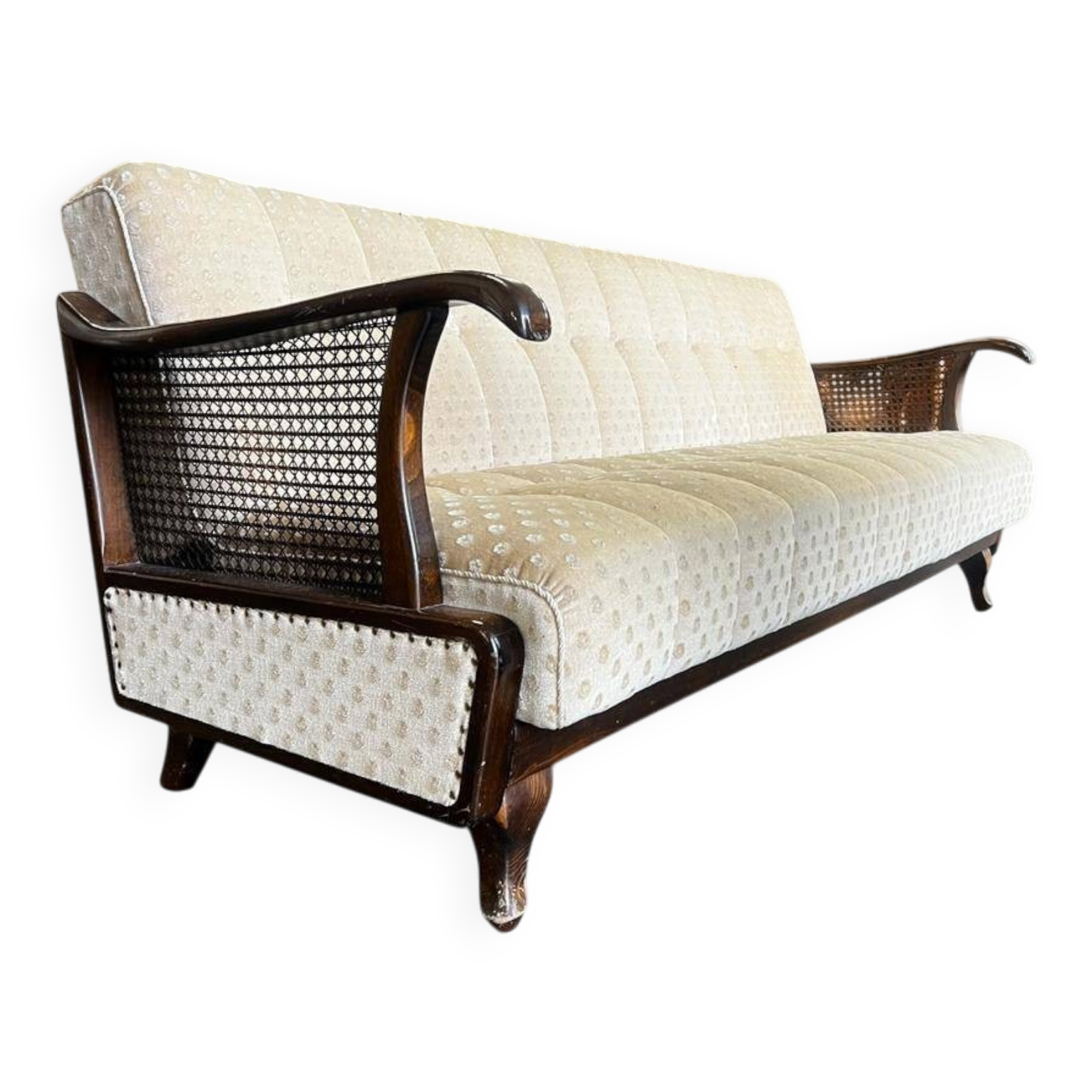 Vintage wooden armchair with rattan weaving.