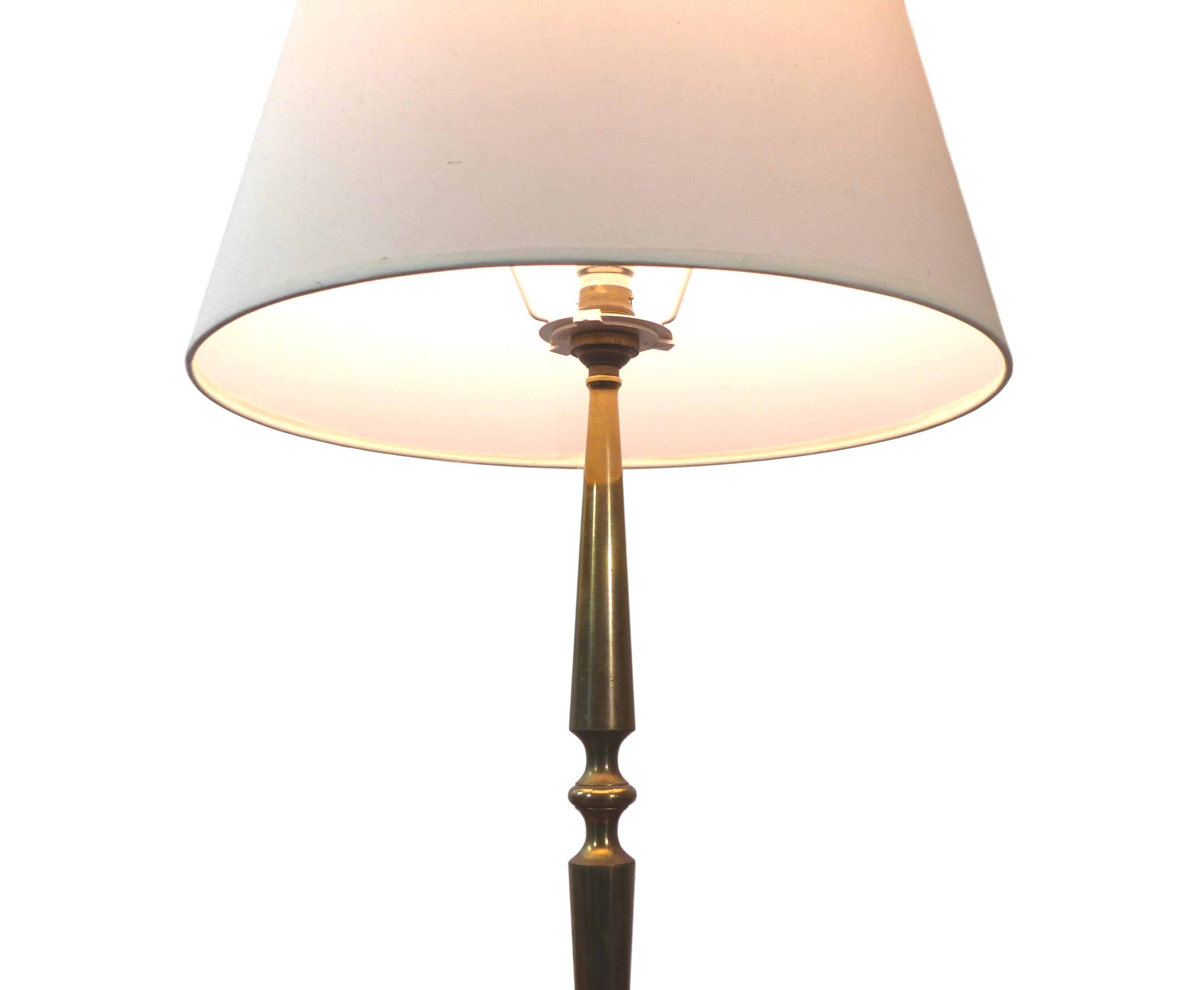 Golden brass tripod table lamp