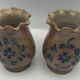 Pair of vintage pottery vases with floral decoration and glaçureau sel