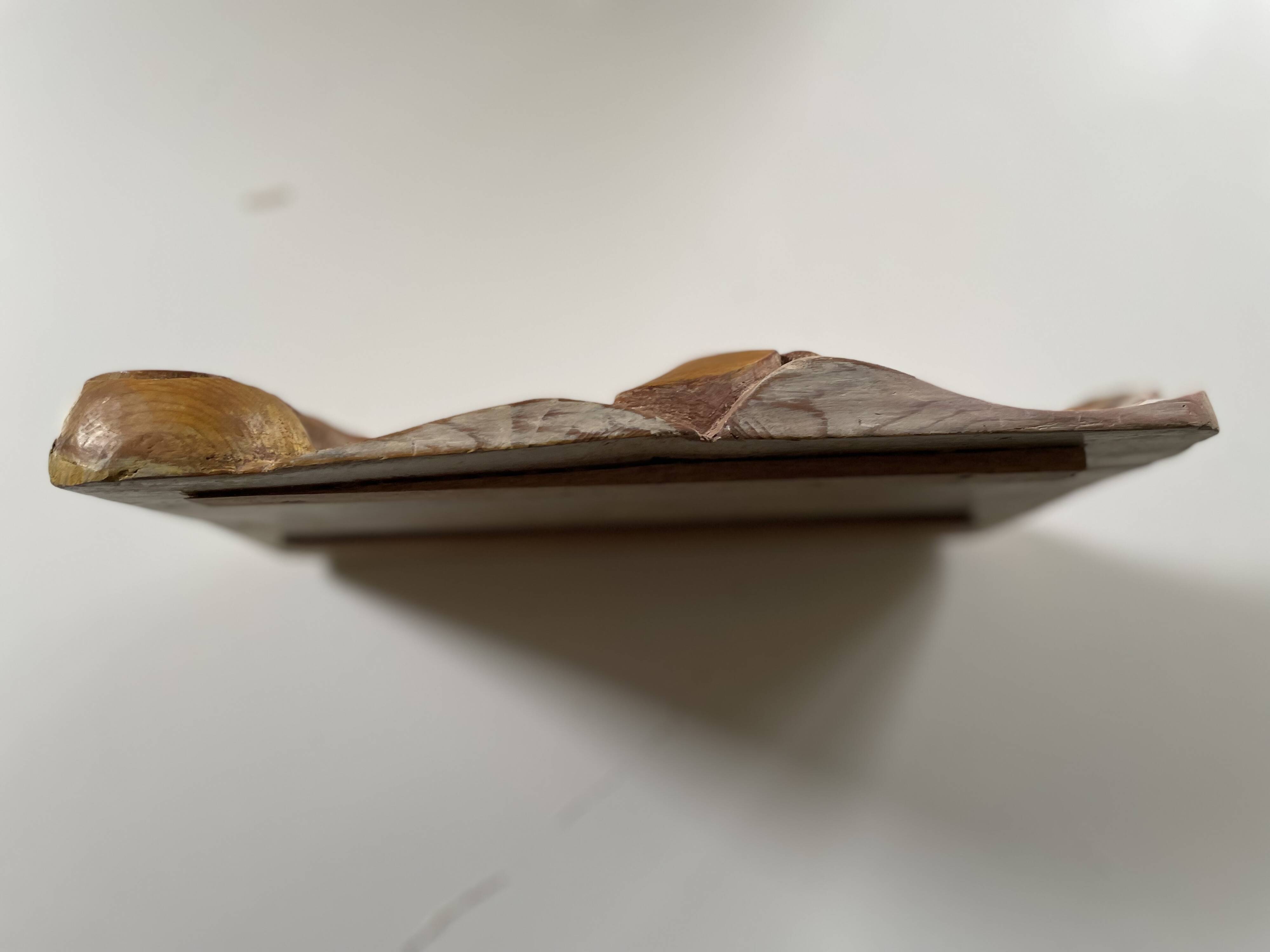 Panneau ancien en bois sculpté au décor de feuillage