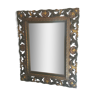 Beveled mirror in polychrome wood