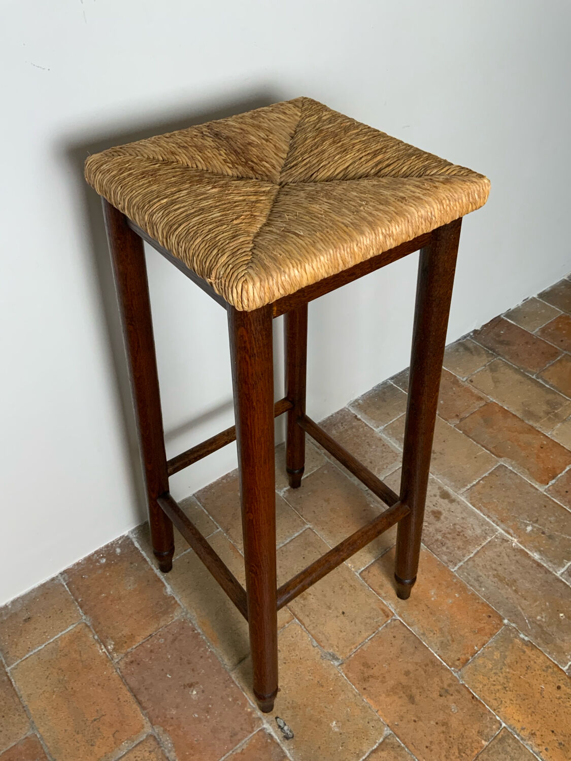 High straw stool