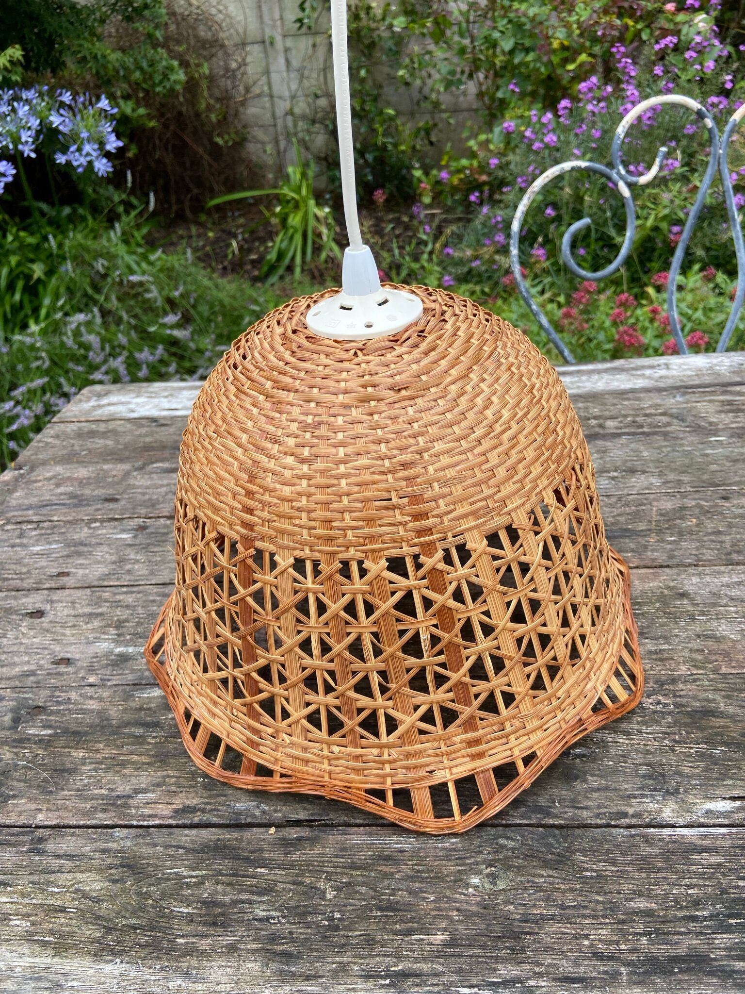 Suspension in rattan and vintage wicker bell shape