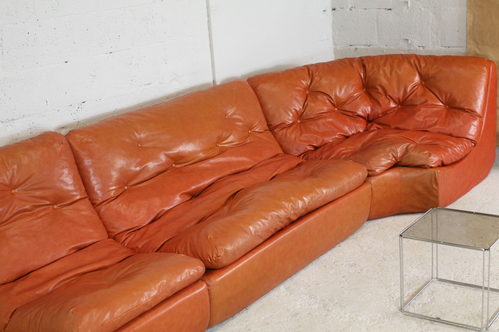 Flexible sofa, orange vinyl and foam, France, circa 1970