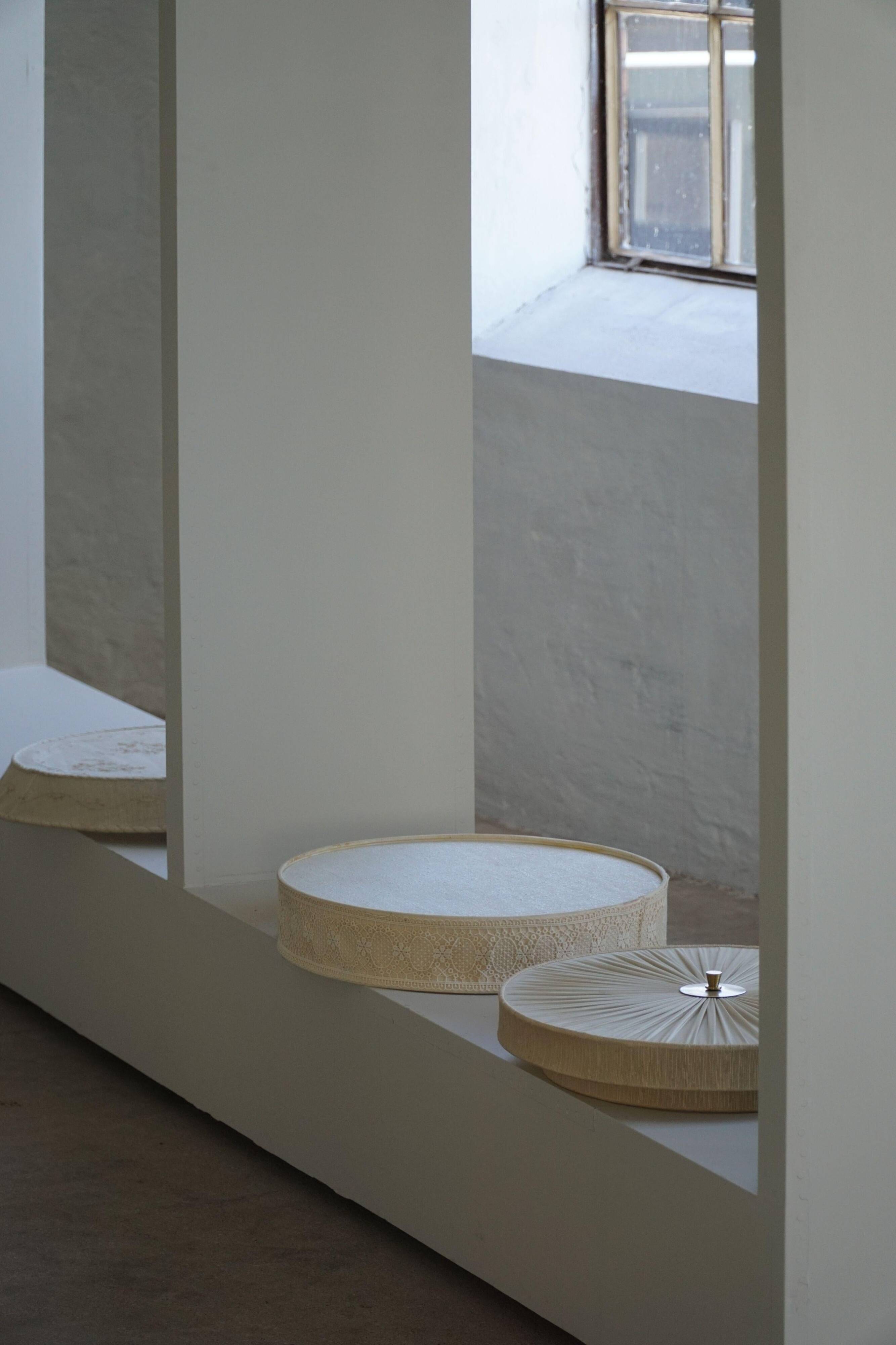 Mid-century modern wall sconce and ceiling light in linen and lace, Sweden, 1950s.