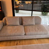 Three-seater fabric sofa