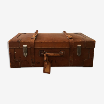 Former leather trunk with Louis Vuitton label holder