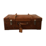 Former leather trunk with Louis Vuitton label holder