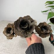 Rose shaped metal candle holder
