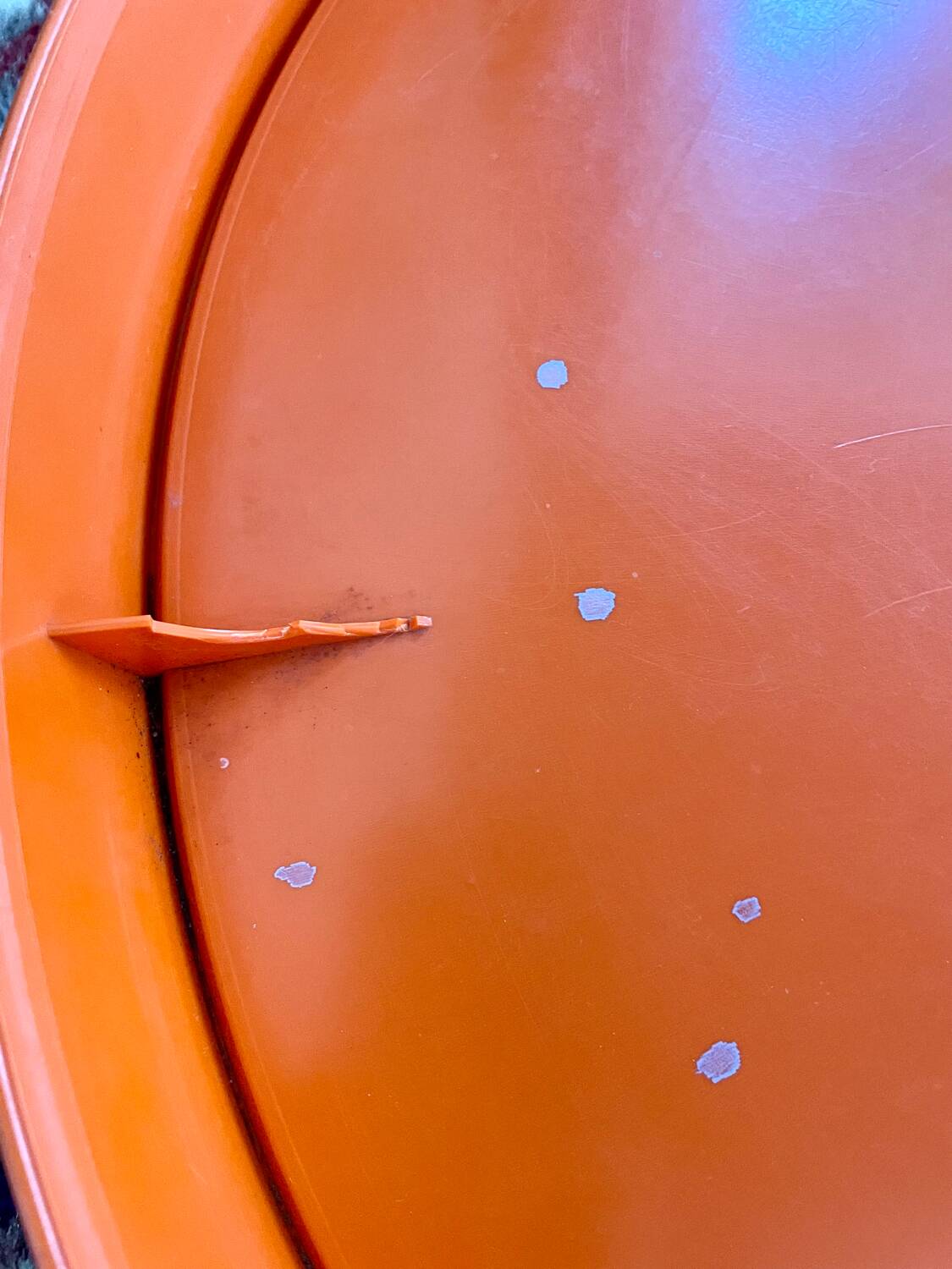 Round orange plastic side table 1970