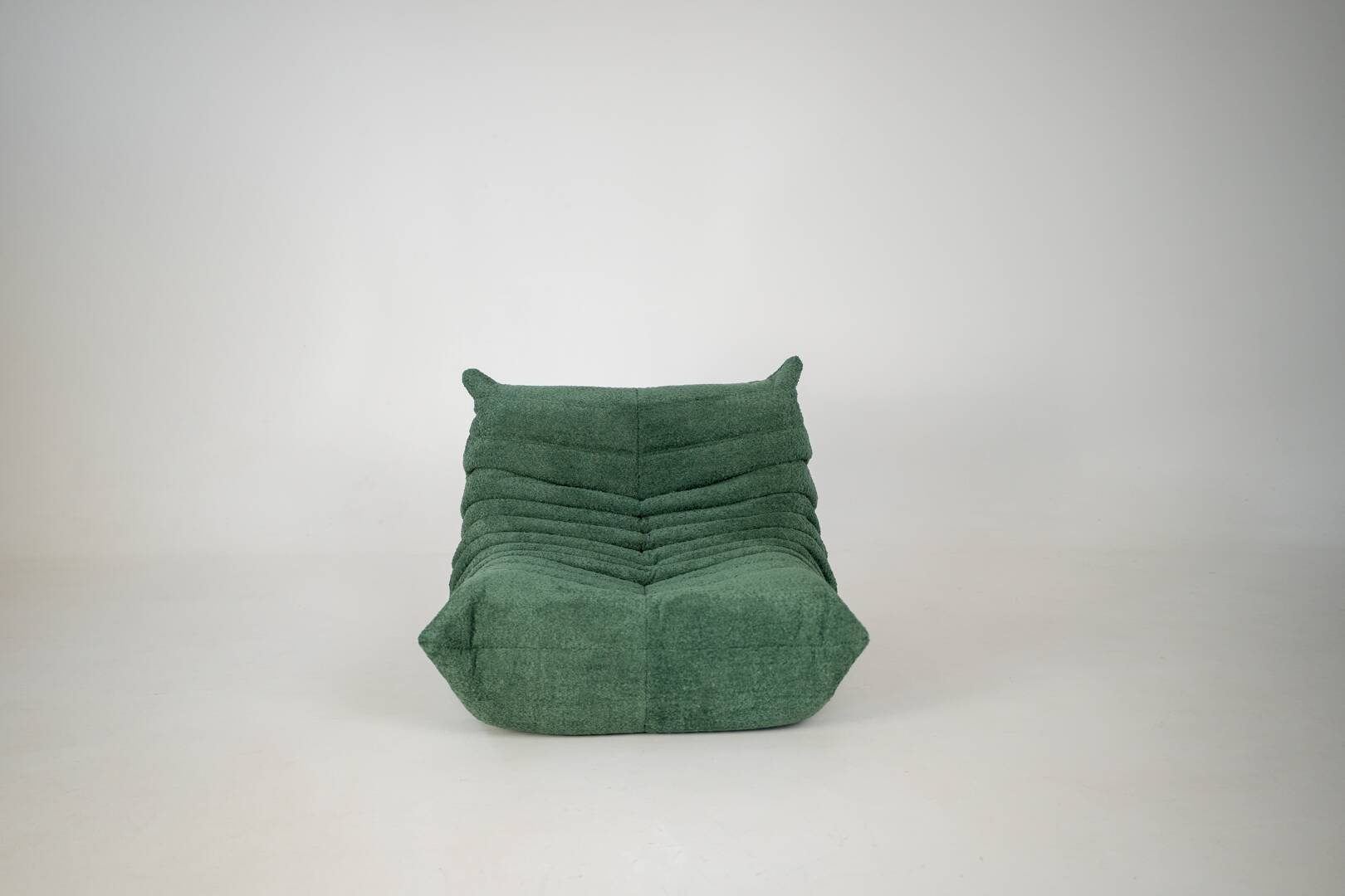 Togo set of armchair and pouf in emerald bucle