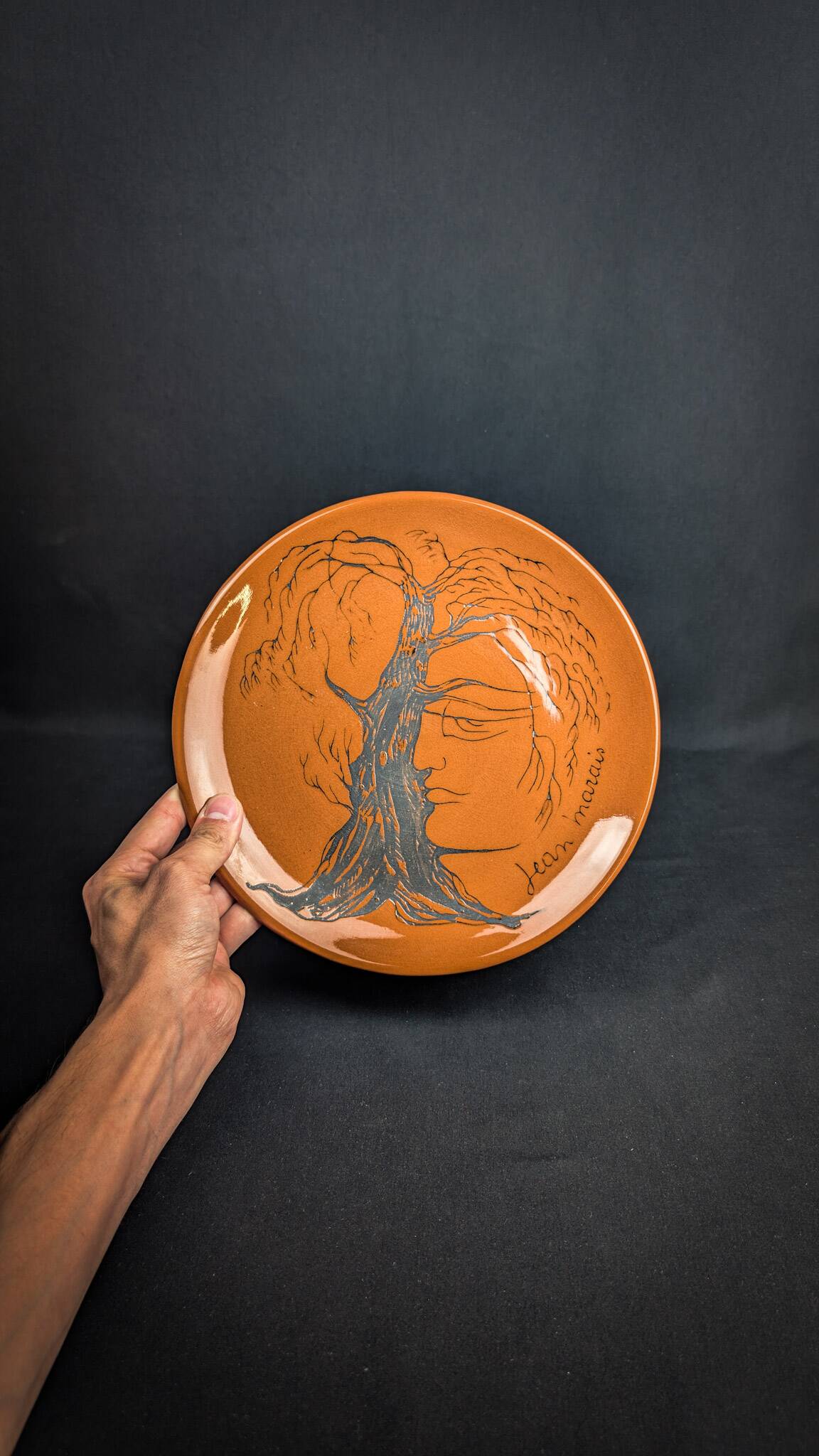 Glazed ceramic plate signed Jean Marais face & tree Vallauris
