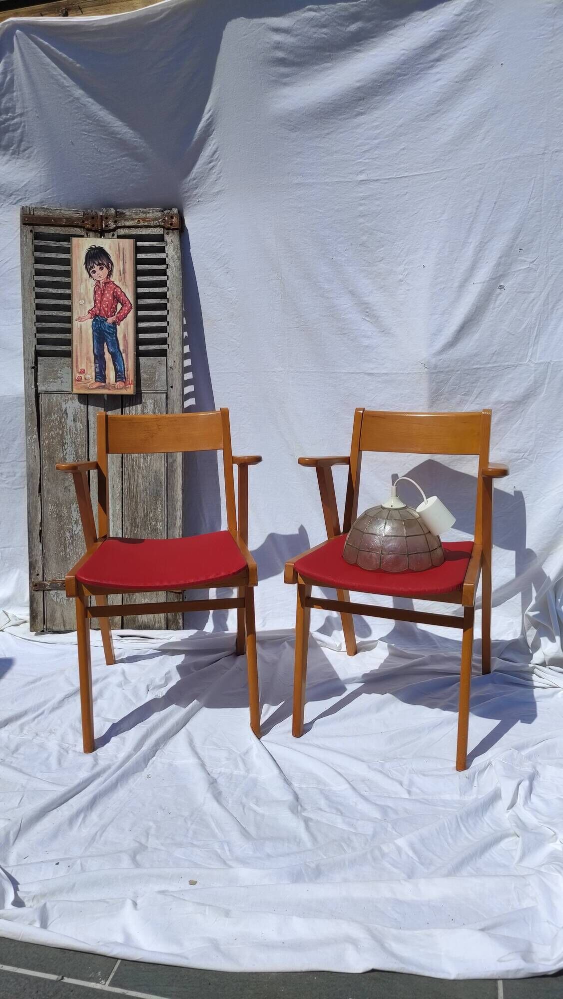 Pair of wooden armchairs and skaï foot compass of the 50s