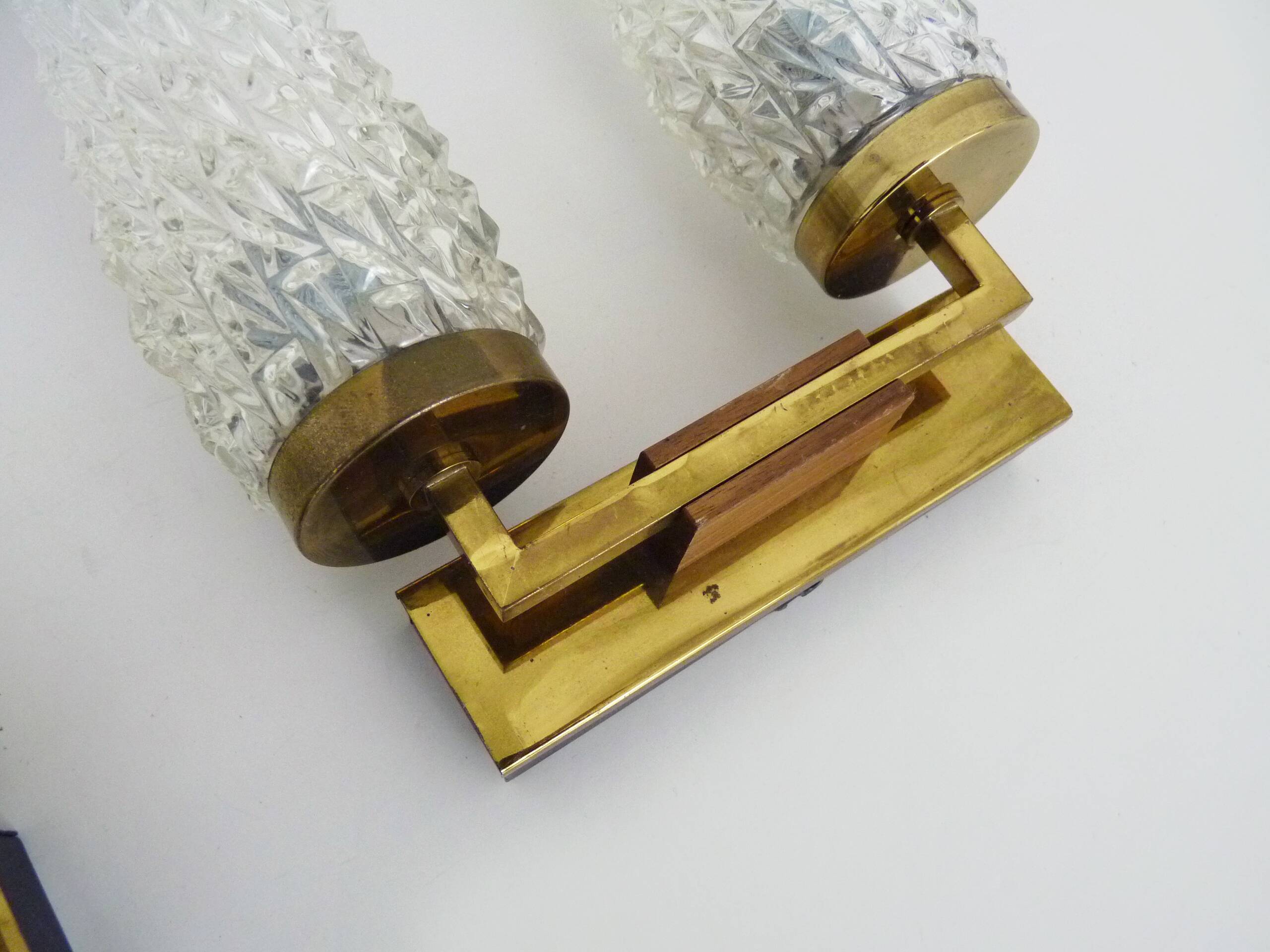 Pair of double-light wall lights, brass, teak globe, glass tubes. 50s-60s