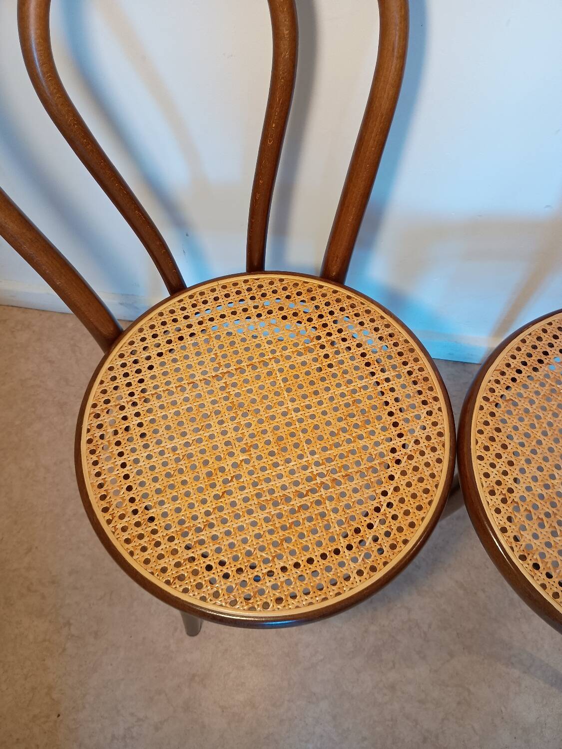 Caned bistro chairs