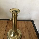 Bougeoir en laiton à poussoir