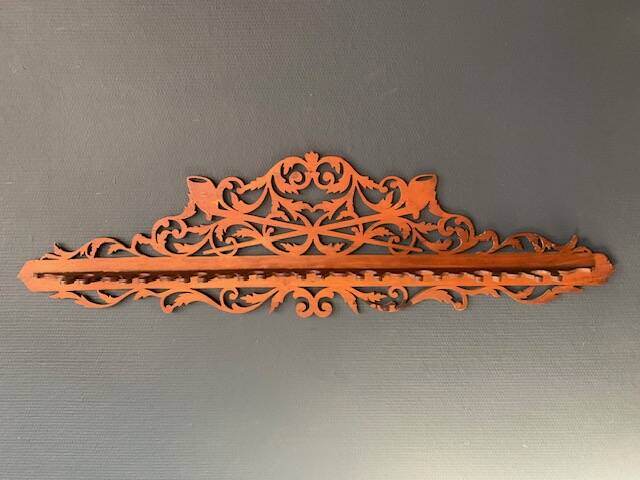 Old cut-out wooden wall display from the 1900s