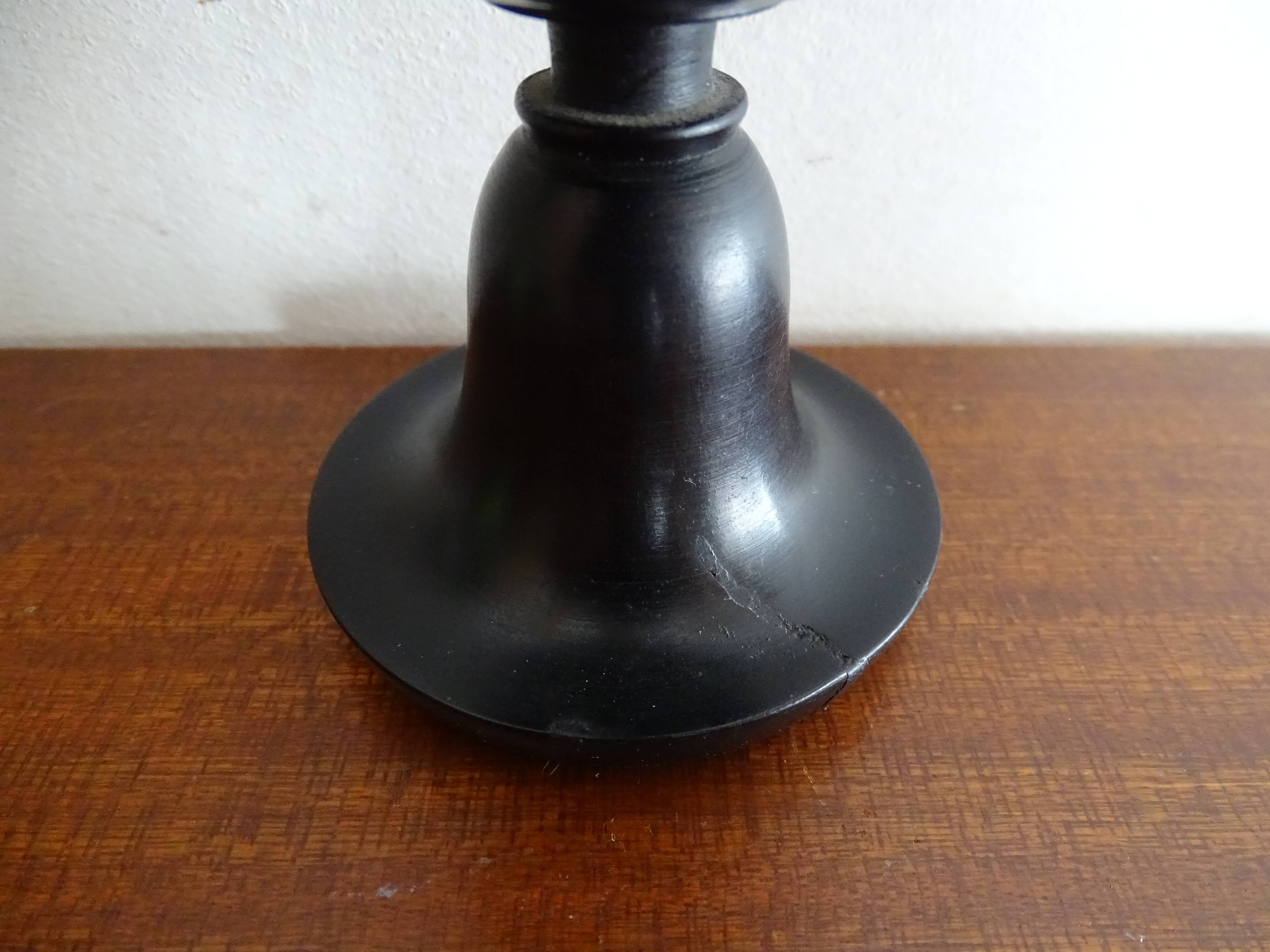 Ostrich egg on blackened wooden base - object of curiosity