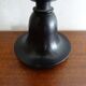 Ostrich egg on blackened wooden base - object of curiosity