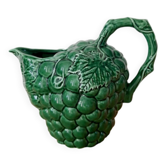 Antique slip pitcher in the shape of a grape