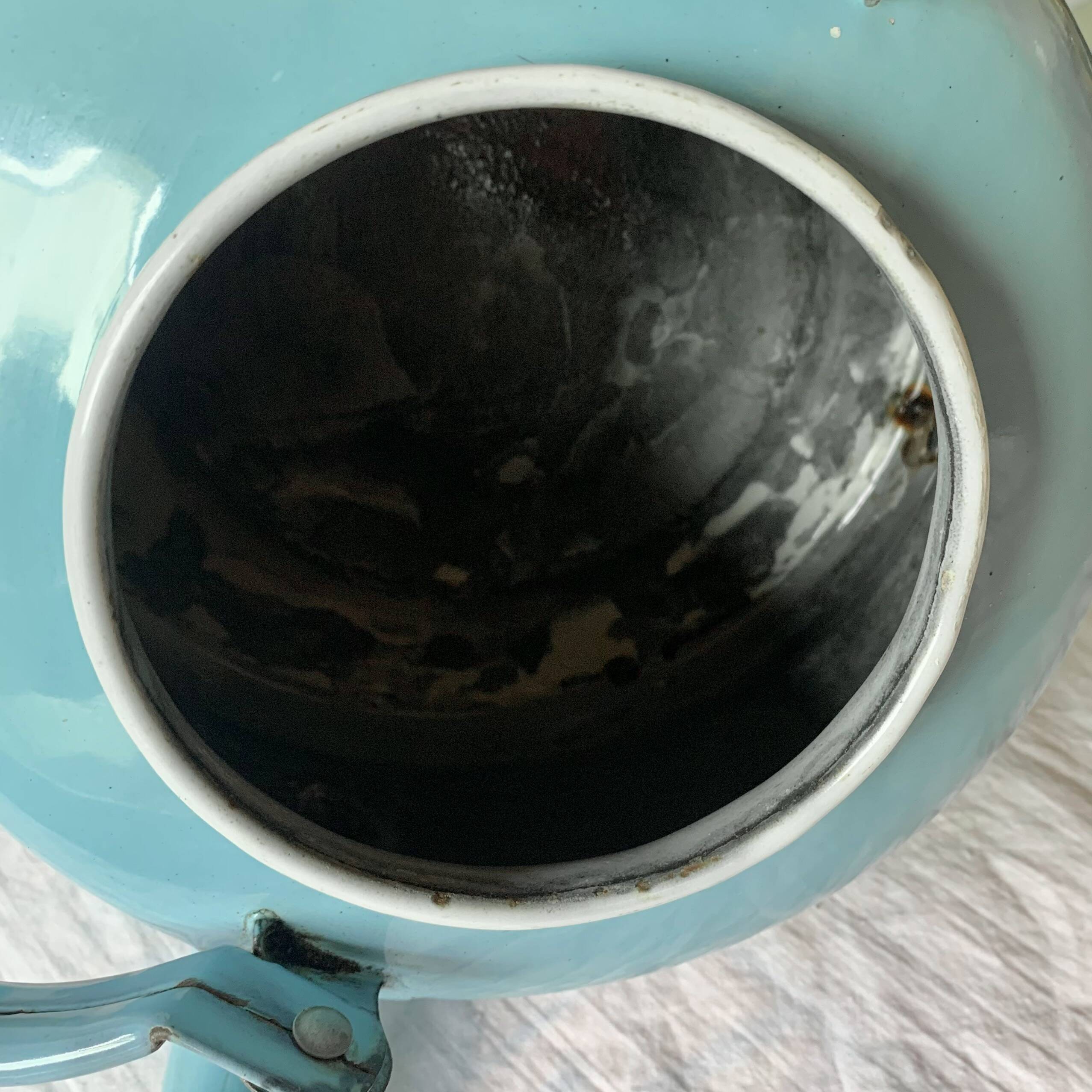Large vintage kettle in blue enameled sheet metal