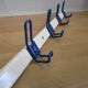 White and blue lacquered steel wall coat holder
