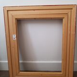 Framed black gilded wood and cream fabric