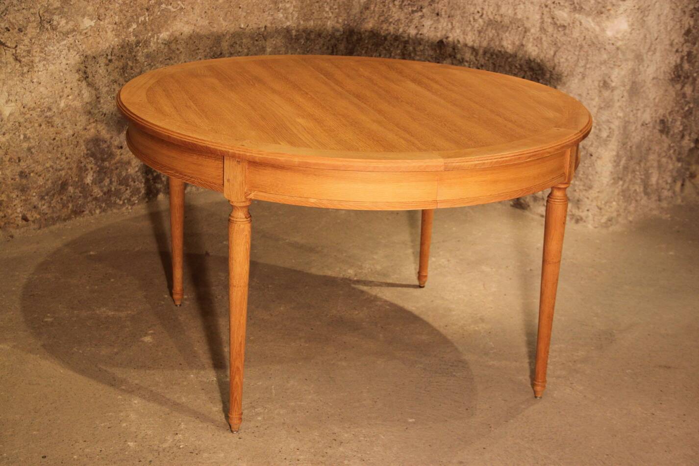 Oval light oak table with extension