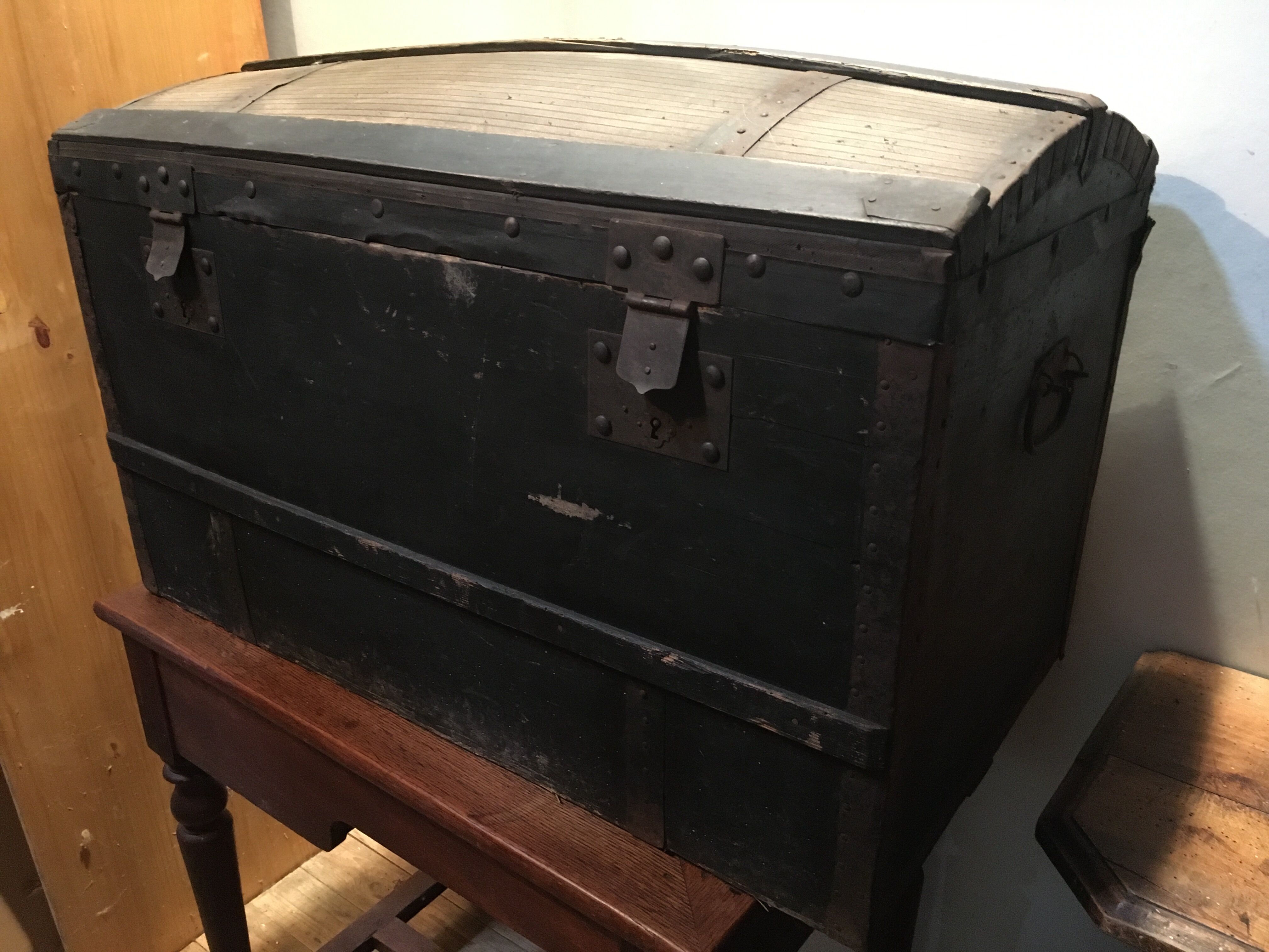 Black travel trunk with a fabric top