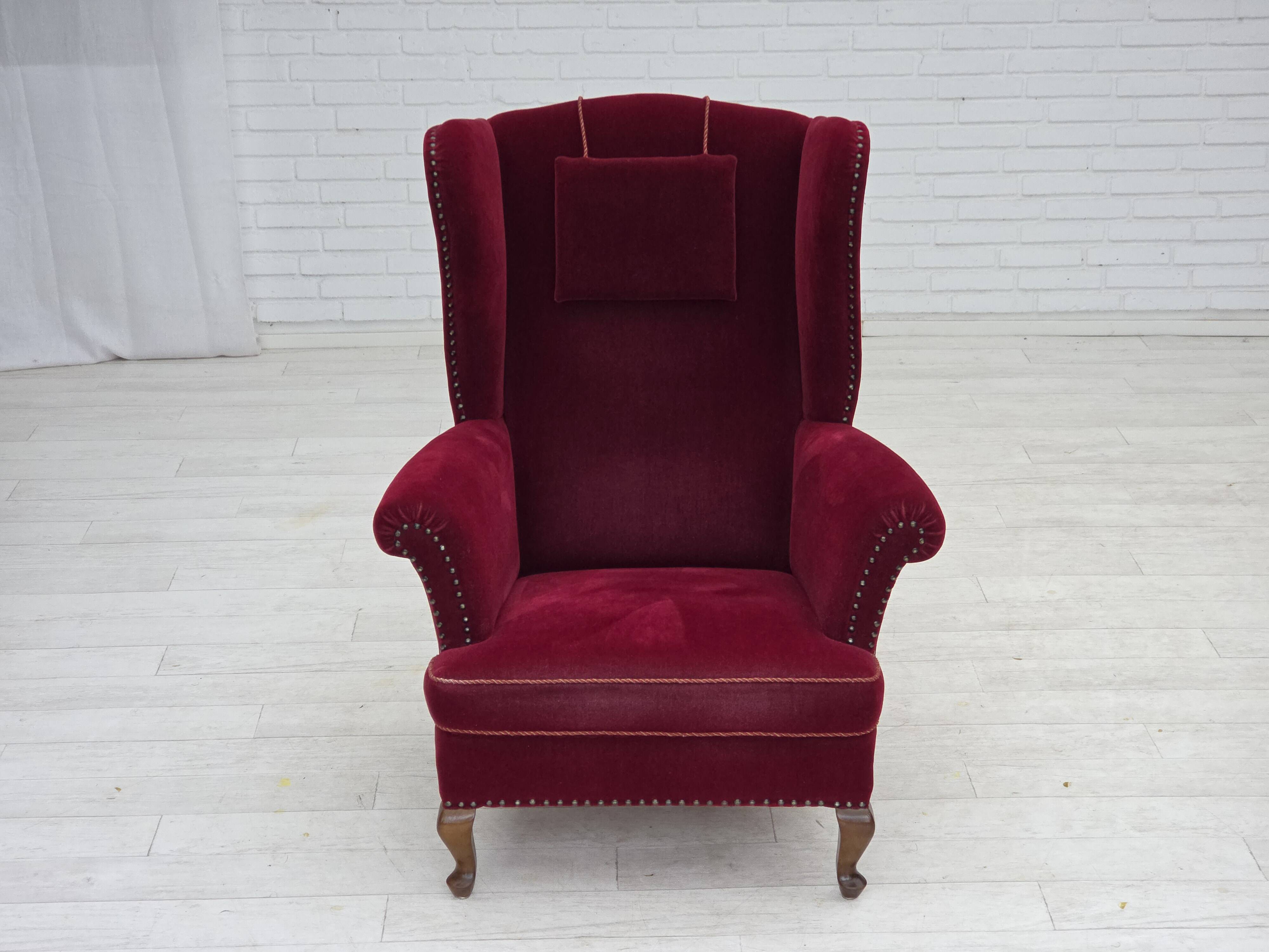 1960s, Danish highback wingback armchair, cherry-red furniture velour.