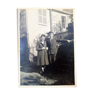 vintage photograph from the 40s, a couple with rockabilly hairstyles